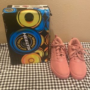 Pink Heelys.. used once brand new without tags
